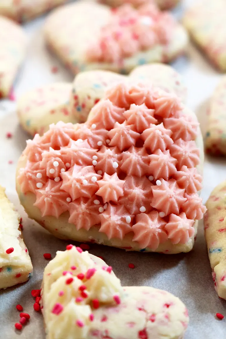 These crunchy funfetti sugar cookies with vanilla butter cream frosting are the right combination to make the best sugar cookies for this special day