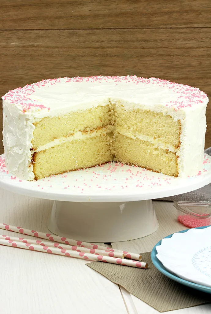 This Vanilla Cake with Whipped Cream Cheese Frosting is perfectly moist, easy and airy vanilla cake with filling made of vanilla cream cheese and heavy whipping cream.