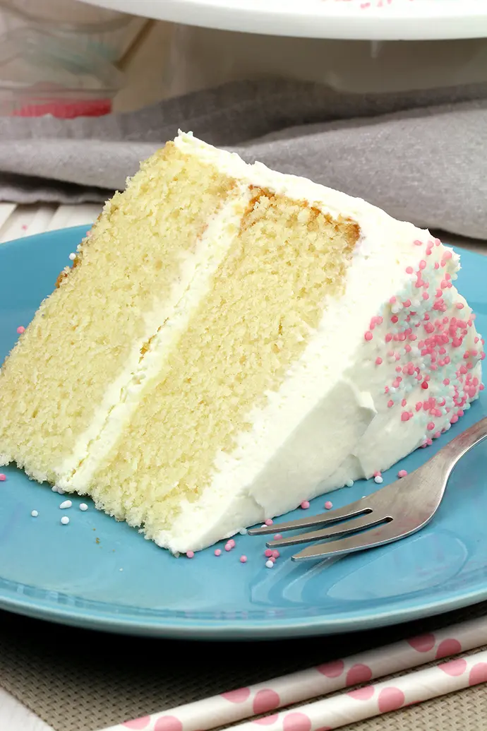 This Vanilla Cake with Whipped Cream Cheese Frosting is perfectly moist, easy and airy vanilla cake with filling made of vanilla cream cheese and heavy whipping cream.