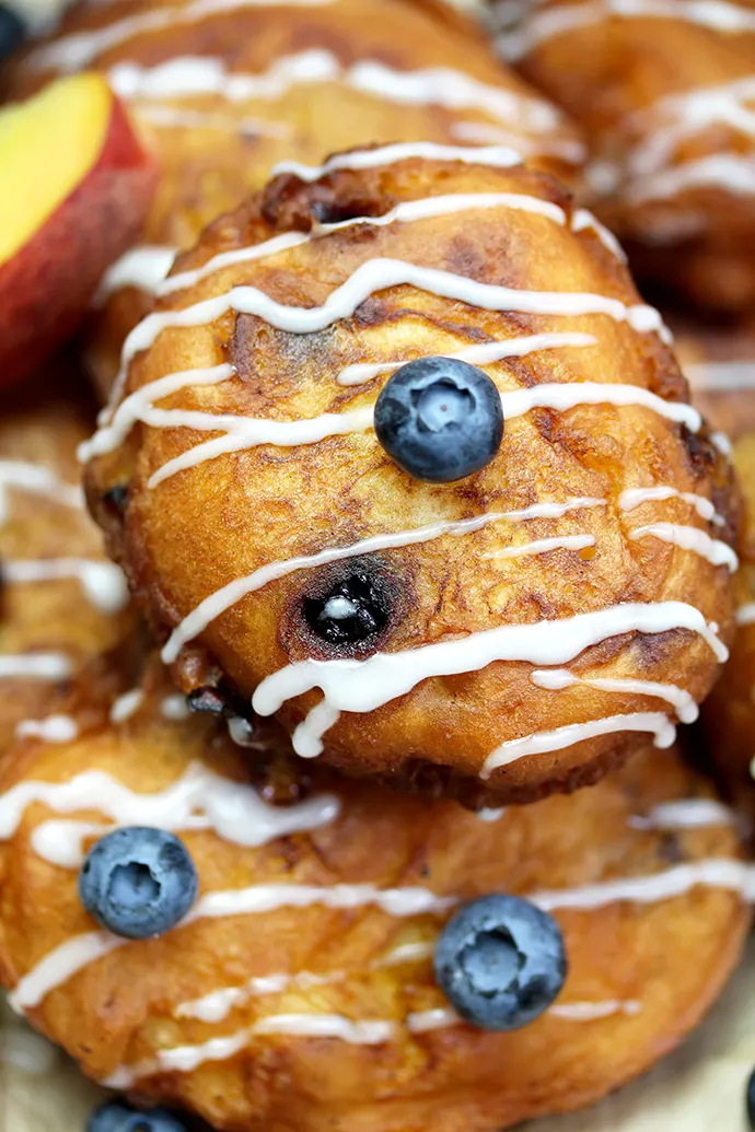 Blueberry Peach Fritters with Vanilla Glaze