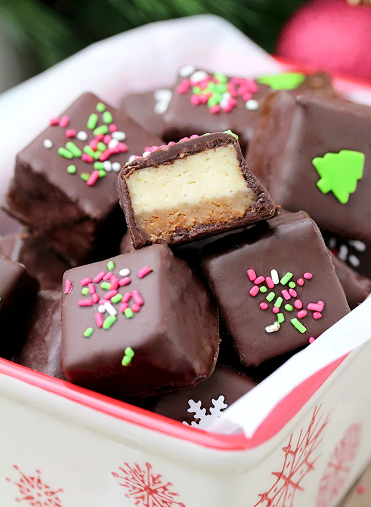 Chocolate Covered Cheesecake Bites made of graham cracker base and a cheesecake layer, covered with chocolate are so delicious. Yummy…