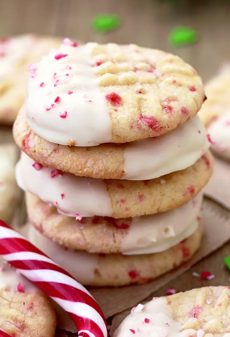 White Chocolate Dipped Candy Cane Sugar Cookies – delicious sugar cookies, just perfect for Christmas. They are easy to make and melt in your mouth. HO HO HO.. Christmas is coming and that makes me so happy. 