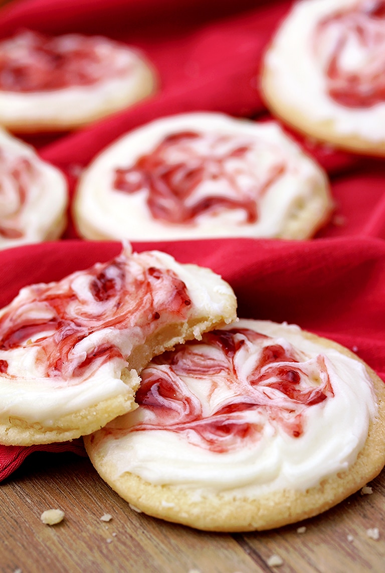 This meltaway cookies topped with cream cheese frosting and swirl with strawberry jam simply melts in your mouth.