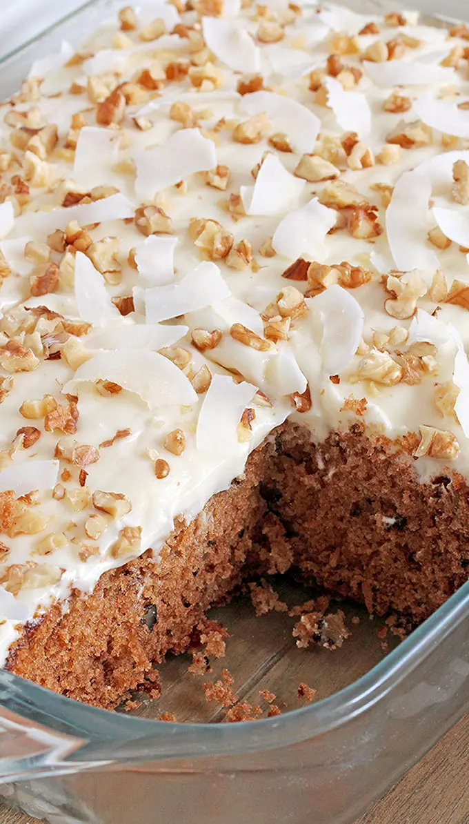 Preacher Cake – easy, super tasty cake with rich, tropical taste topped with whipped cream cheese frosting, chopped walnuts and coconut chips. This harmony of flavors is made for true pleasure. Pineapple, coconut and walnut combination in this cake is perfect and gives it a special taste.