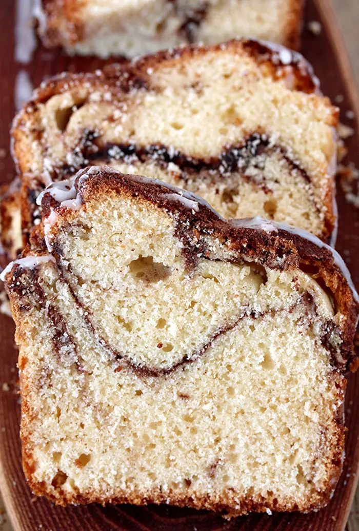 You can find the recipe for our favorite Cinnamon Sugar Swirl Bread, here. This perfectly soft and moist bread is made of simple ingredients that can be found in every kitchen and it’s as simple as making a swirl out of cinnamon – sugar mixture and then drizzle it with vanilla g