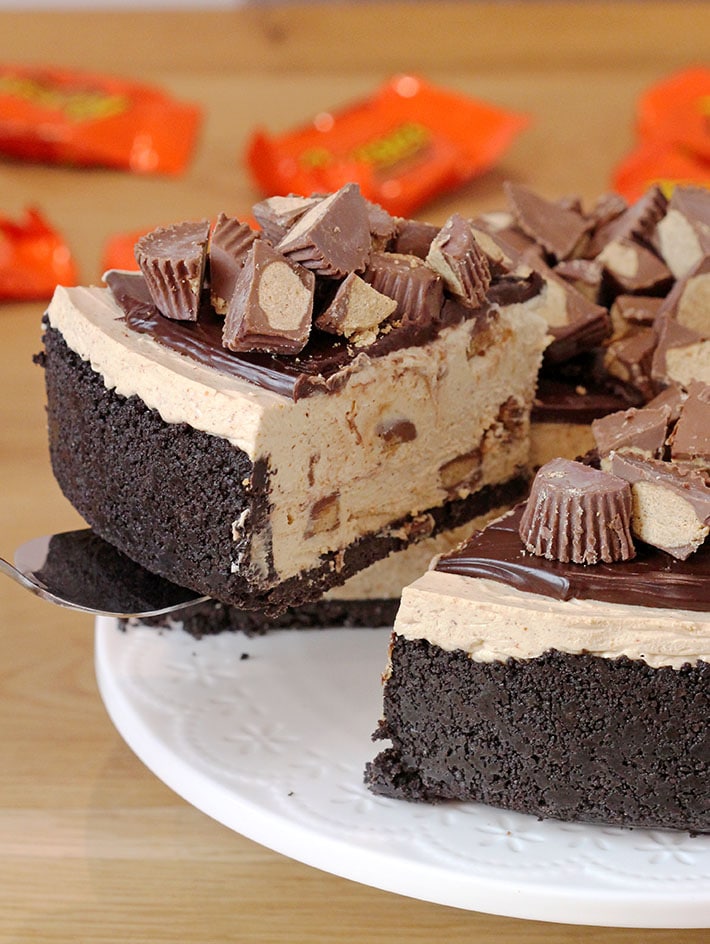 Reese’s Peanut Butter Cheesecake – Oreo cookie crust, peanut butter cheesecake filling with pieces of Reese’s cups, topped with chocolate ganache and pieces of Reese’s peanut butter cups make this strong decadent cheesecake.