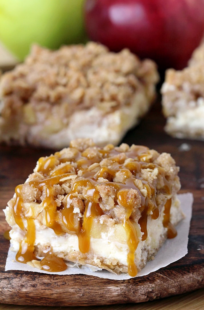 Caramel Apple Crisp Cheesecake Bars – crunchy oat crust and topping, creamy cheesecake filling, juicy apple – cinnamon filling, all drizzled with caramel on top, make a perfect fall dessert.