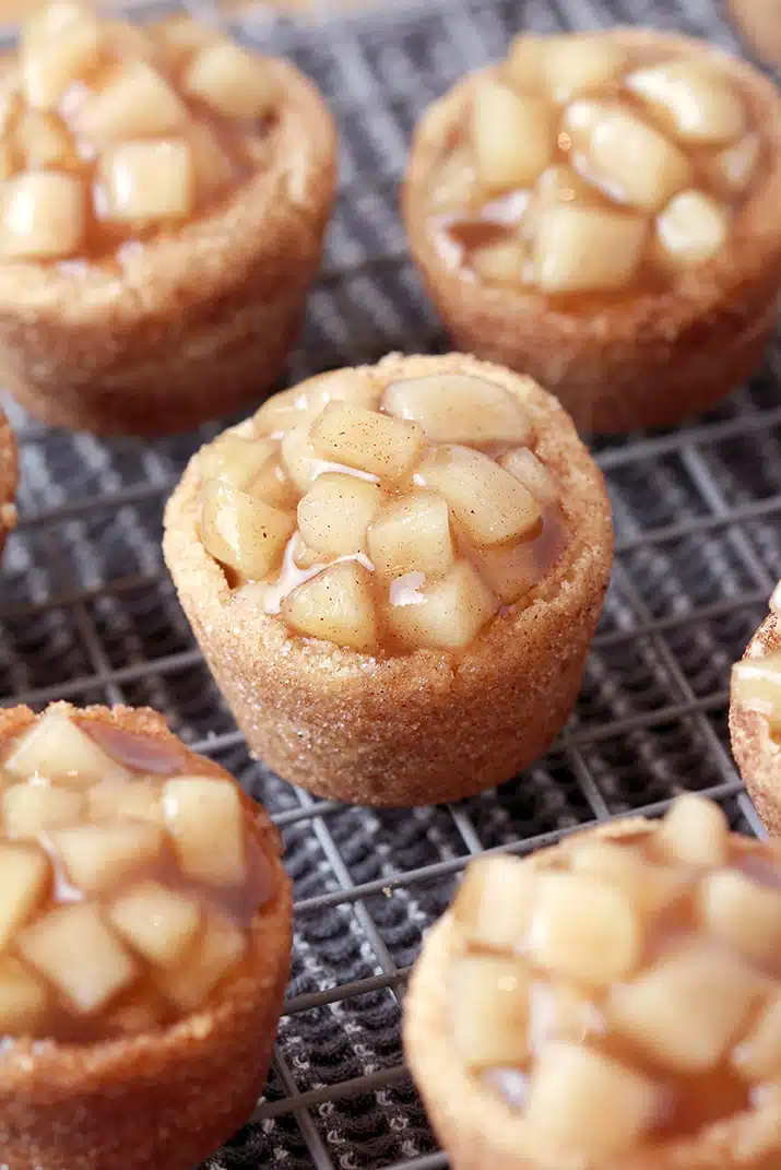 Snickerdoodle Apple Pie Bites – snickerdoodle mini cups filled with homemade apple pie filling are perfect small bites for all occasions. I like to prepare them for holidays because they look fancy on a holiday dessert plate and everyone loves their amazing taste.