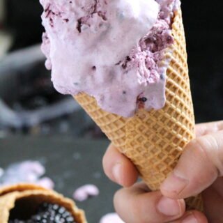 Delicious Blackberry Cheesecake Ice Cream cool and refreshing dessert perfect for hot summer days. Great combo of fresh blackberries and cream cheese in the crunchy cones.