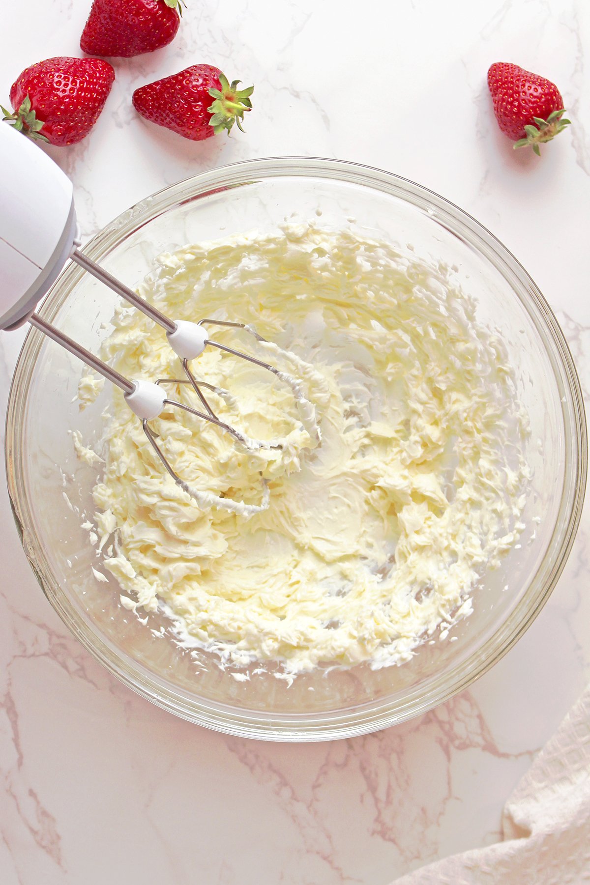 Step 2: Cream Butter & Cream Cheese
Beat butter and cream cheese until smooth. Add sugar and mix until light and fluffy.
