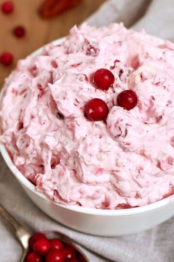This salad is a perfect dessert for Thanksgiving Dinner or New Year's Eve feast. Cranberry Cheesecake Fluff Salad is quick, simple and easy to prepare ♥