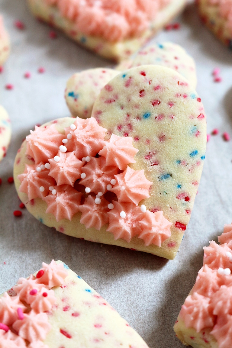 Valentine’s Sugar Cookies with Vanilla Buttercream Frosting are a perfect choice if you wish to make your Valentine’s Day sweeter and surprise your loved ones ♥