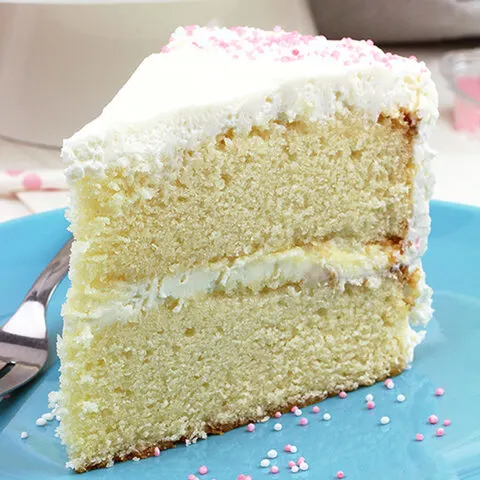 This Vanilla Cake with Whipped Cream Cheese Frosting is perfectly moist, easy and airy vanilla cake with filling made of vanilla cream cheese and heavy whipping cream.