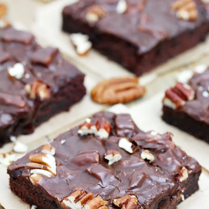 Texas Chocolate Sheet Cake is thin, super moist chocolate cake, topped with warm chocolate frosting and pecans.