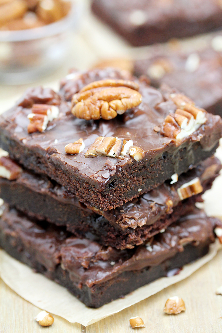 Texas Chocolate Sheet Cake is thin, super moist chocolate cake, topped with warm chocolate frosting and pecans