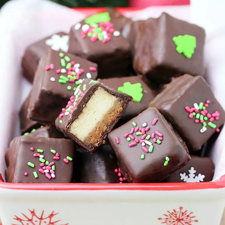 Chocolate Covered Cheesecake Bites made of graham cracker base and a cheesecake layer, covered with chocolate are so delicious. Yummy…