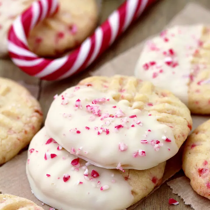 White Chocolate Dipped Candy Cane Sugar Cookies – delicious sugar cookies, just perfect for Christmas. They are easy to make and melt in your mouth. HO HO HO.. Christmas is coming and that makes me so happy.