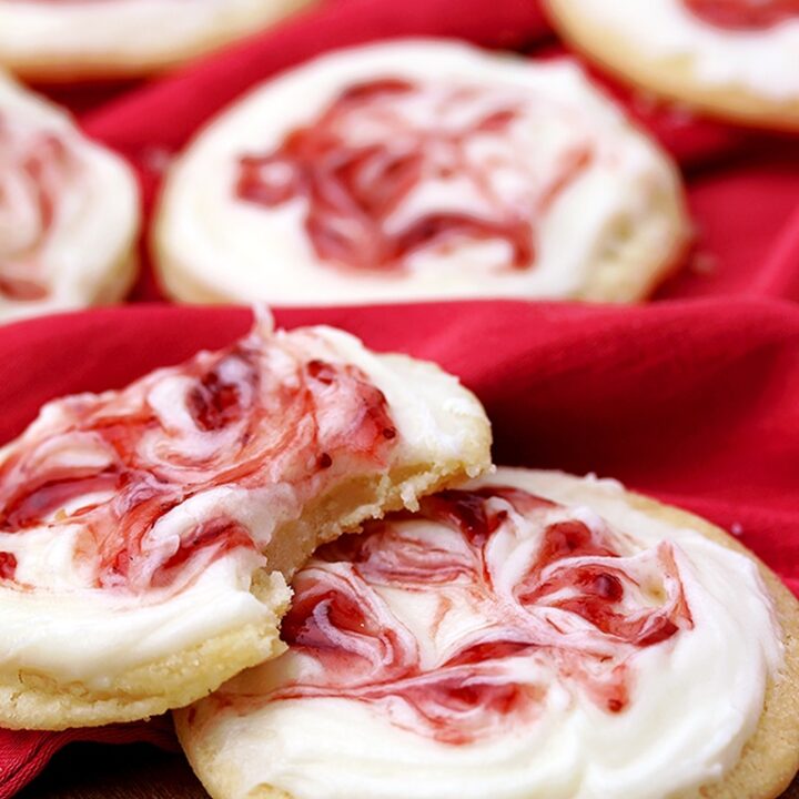 These meltaway cookies topped with cream cheese frosting and swirled with strawberry jam, simply melts in your mouth.