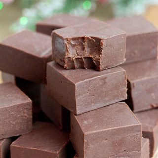 Easy Chocolate Fudge Recipe – this creamy chocolate fudge that is made of only four ingredients in 10 minutes time is a perfect holiday treat. You will need chocolate, sweet condensed milk, unsalted butter and vanilla to prepare a number one holiday treat.