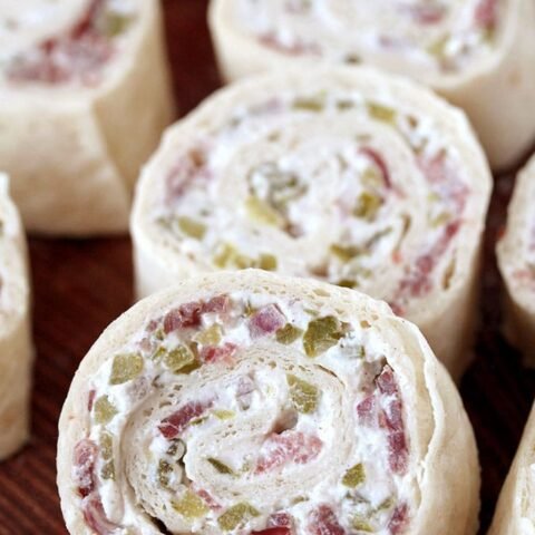 Dill Pickle Tortilla Roll Ups – these party appetizers are filled with cream cheese, sour cream, light mayo, dill pickles, dry beef, onion, ground black pepper and garlic powder, make a perfect choice for Game Day or any other party or holiday.