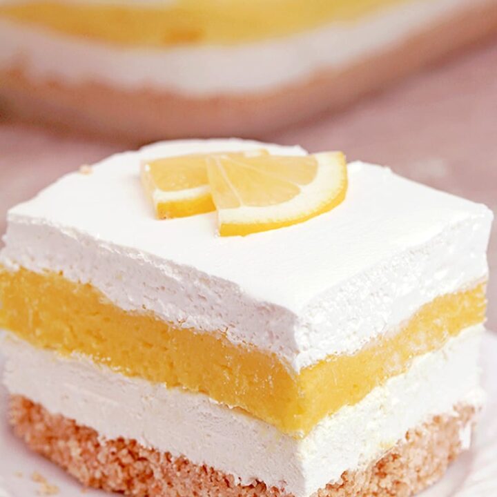 Easy Lemon Cheesecake Lasagna is a quick and simple layered dessert. What makes it so tasty is a Golden Oreo base, cheesecake layer, lemon pudding layer and whipped topping on top