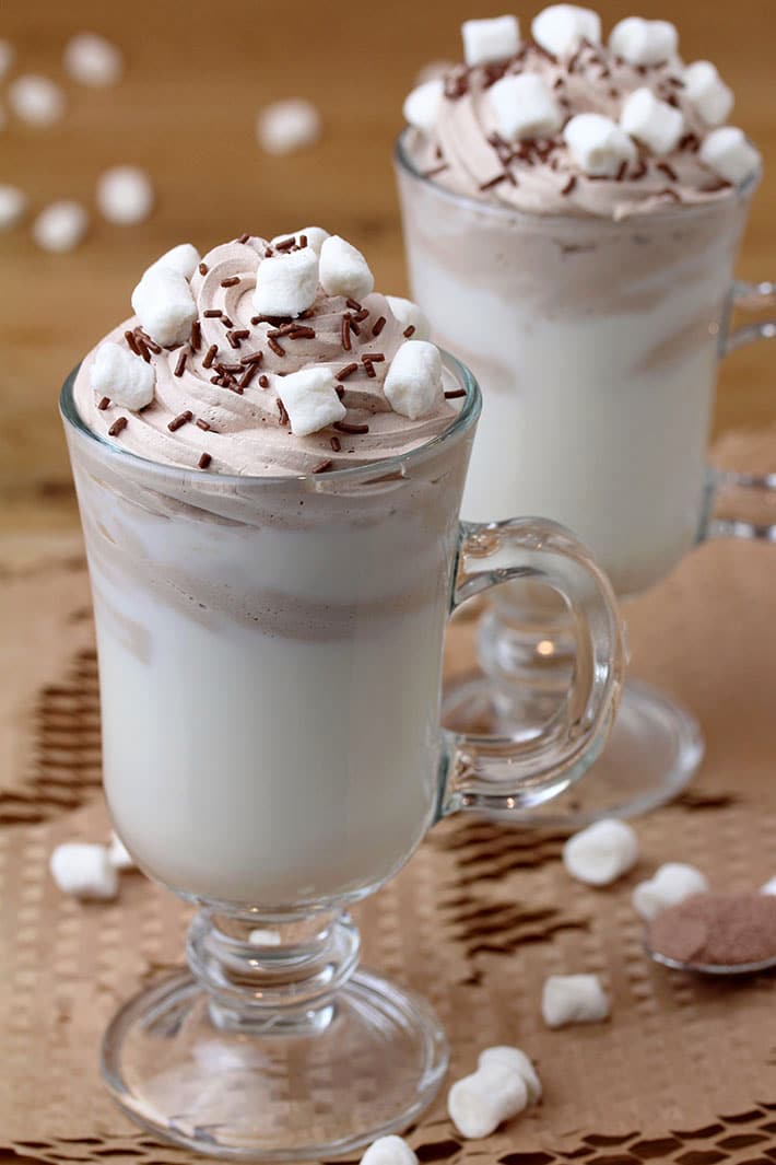 Whipped Hot Chocolate – hot or cold milk on the bottom of a cup, whipped whipping cream on top and hot chocolate mix create an amazing flavor, when they are mixed together. This rich cup of hot chocolate also looks amazing. It is very quick and easy to prepare – only 3 minutes and 4 ingredients are necessary for you to make this perfectly creamy hot chocolate.