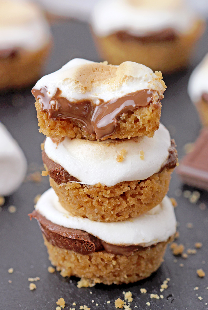 S’ mores Bites – only 5 ingredients and 18 minutes of your time is everything you need to make these incredibly delicious bite – size treats. Mini buttery graham crackers cups, melted Hershey chocolate inside, topped with gooey toasted marshmallows – a perfect combination!