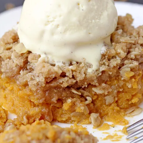 This quick and easy Pumpkin Pie Crisp is a delicious fall dessert with crunchy oat topping and creamy pumpkin filling, perfect for Thanksgiving Day. Serve it with a scoop of vanilla ice cream or whipped topping and a delicious fall treat will be on your plate.