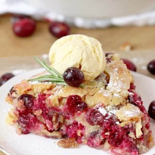 Nantucket Holiday Cranberry Pie – juicy cranberry filling with crunchy pecans and a flaky cake layer on top – in one word perfection! Serve warm with a scoop of vanilla ice cream or whipped topping and you’ll enjoy every bite of it.