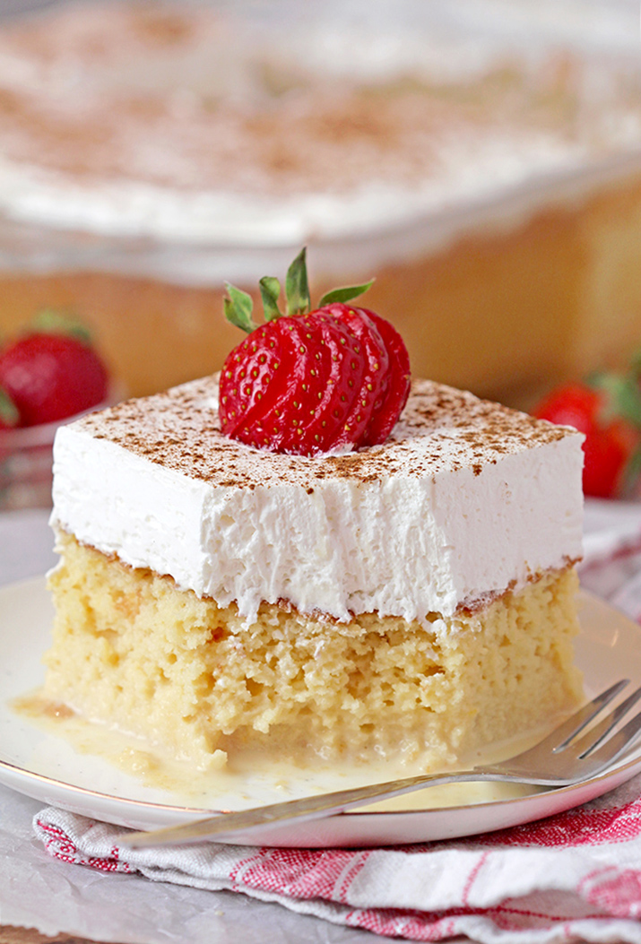 This light and airy sponge cake soaked in three milks, topped with fluffy whipped cream, cinnamon and strawberries is the juiciest cake you’ll ever taste. This popular Mexican cake got its name from Spanish Tres Leches Cake, meaning Three ‘Milks’ Cake.