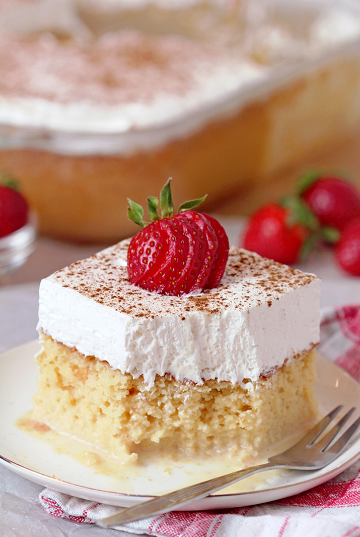 This light and airy sponge cake soaked in three milks, topped with fluffy whipped cream, cinnamon and strawberries is the juiciest cake you’ll ever taste. This popular Mexican cake got its name from Spanish Tres Leches Cake, meaning Three ‘Milks’ Cake.