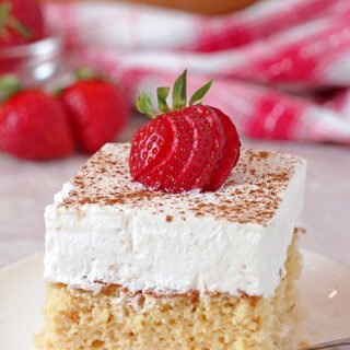 This light and airy sponge cake soaked in three milks, topped with fluffy whipped cream, cinnamon and strawberries is the juiciest cake you’ll ever taste. This popular Mexican cake got its name from Spanish Tres Leches Cake, meaning Three ‘Milks’ Cake