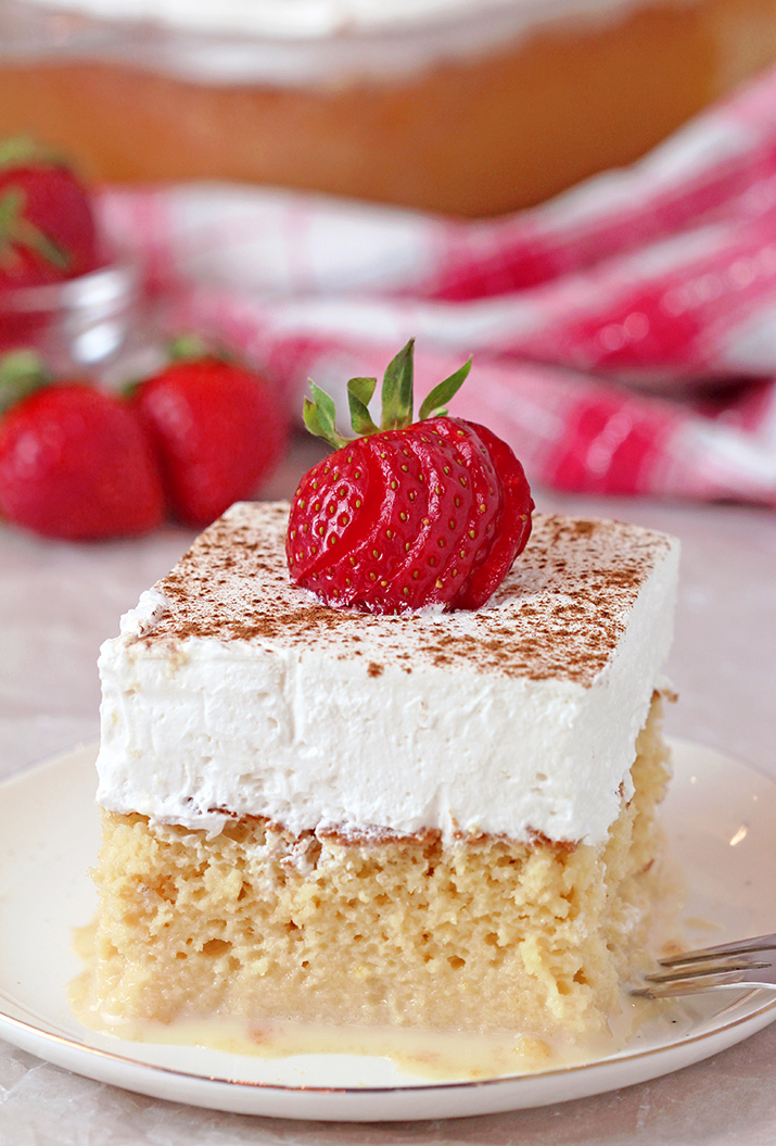 This light and airy sponge cake soaked in three milks, topped with fluffy whipped cream, cinnamon and strawberries is the juiciest cake you’ll ever taste. This popular Mexican cake got its name from Spanish Tres Leches Cake, meaning Three ‘Milks’ Cake
