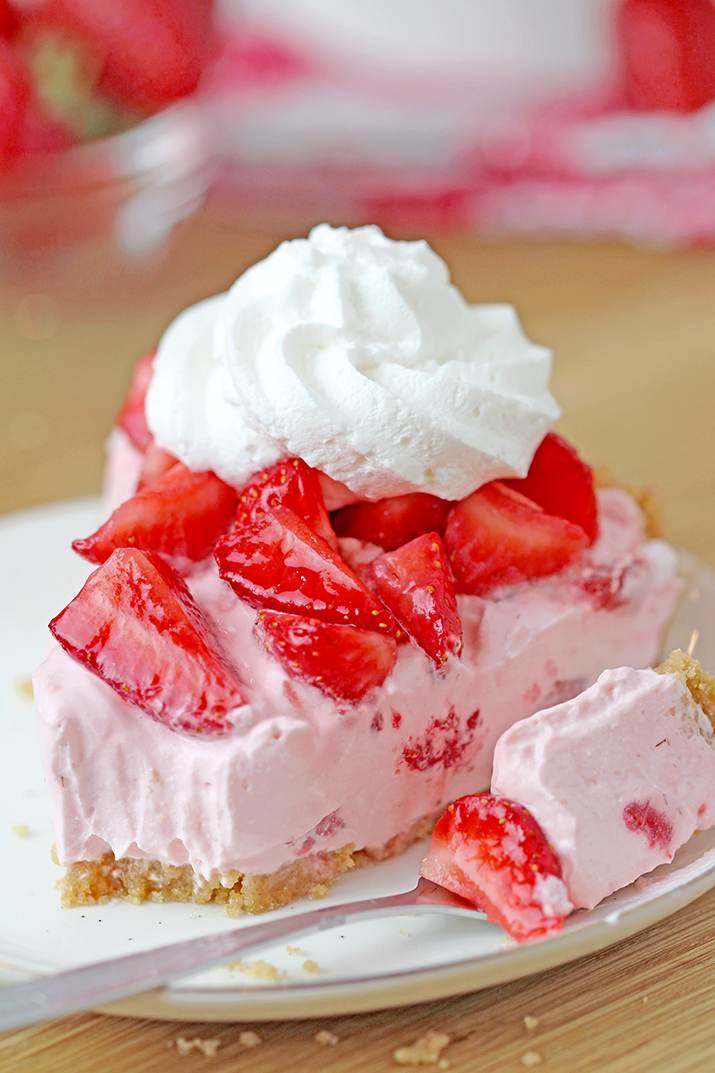 This Strawberry Cheesecake is an easy cake with cream cheese and whipped cream, filled with strawberry sauce on graham cracker crust, topped with fresh, juicy strawberries and whipped topping. I love preparing no bake dessert recipes, it takes less time to make them and I don’t have to turn the oven on - perfect for warm days. 