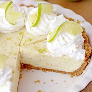 Key Lime Pie - make this simple and easy pie with homemade graham crackers crust, smooth filling from sweetened condensed milk, sour cream, key lime juice and zest with whipped cream on top and you’ll surely enjoy every bite of it. Made with few simple ingredients and yet very tasty and refreshing, this pie is definitely one of my favorites.
