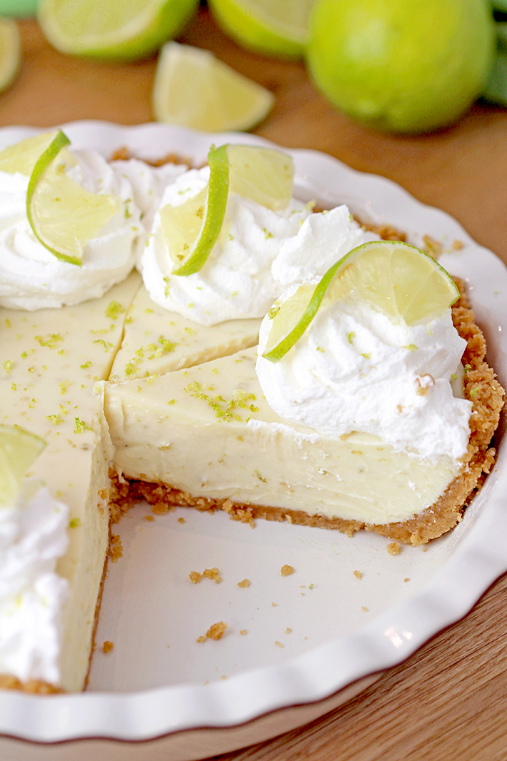 Key Lime Pie - make this simple and easy pie with homemade graham crackers crust, smooth filling from sweetened condensed milk, sour cream, key lime juice and zest with whipped cream on top and you’ll surely enjoy every bite of it. Made with few simple ingredients and yet very tasty and refreshing, this pie is definitely one of my favorites.