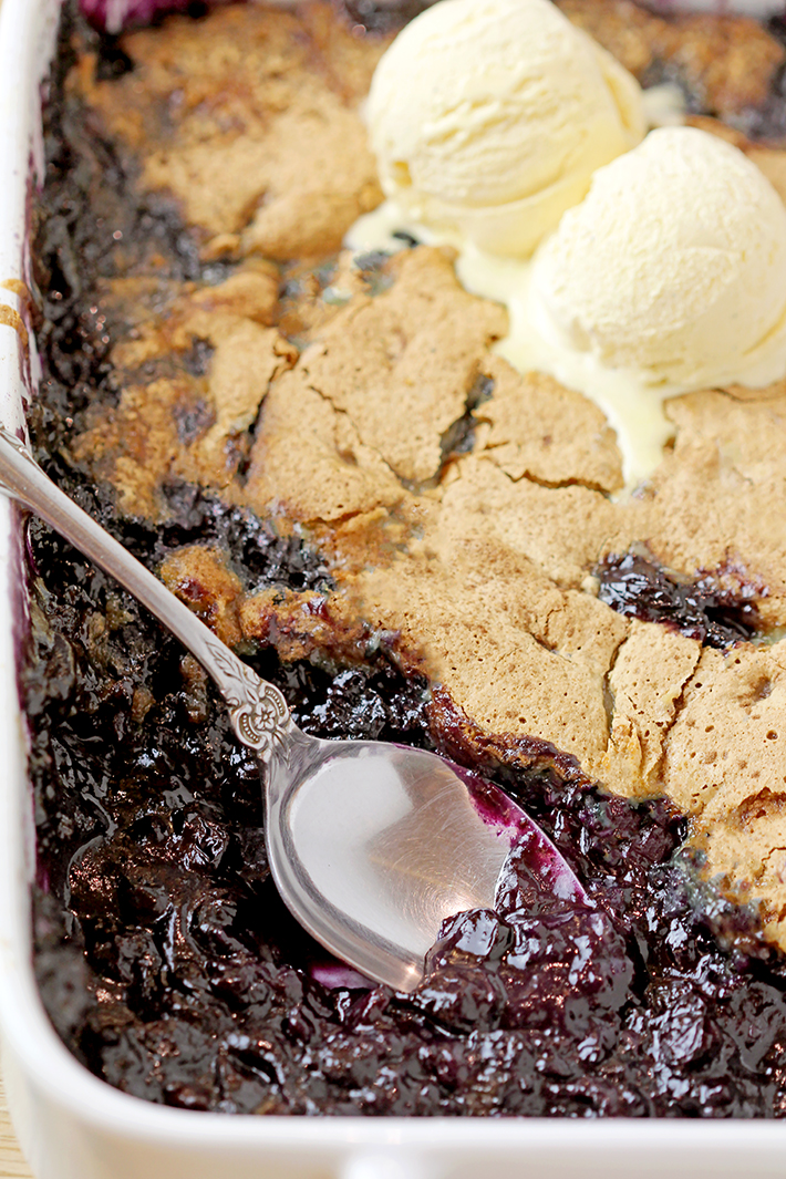 This old fashioned Blueberry Cobbler is the easiest recipe for the tastiest dessert from ingredients you already have on hand, it’s simply perfect. Sweet, juicy blueberries coated with crunchy buttery batter are best served warm with a scoop of vanilla ice cream. 