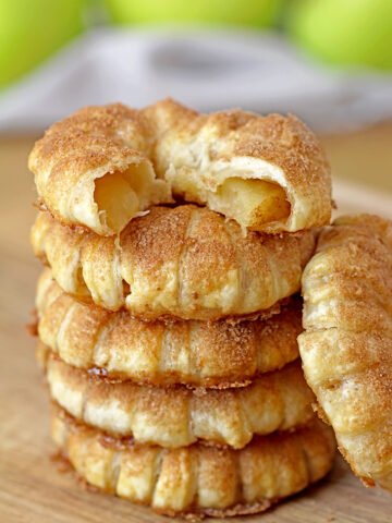These Puff Pastry Apple Cinnamon Rings are a light treat made with only a few ingredients and it's perfect for the upcoming fall days. You will love juicy apples with cinnamon in a flaky puff pastry at first bite. They taste like apple pie and yet, they’re so different. These lovely rings are a must make fall treat. 