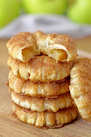 These Puff Pastry Apple Cinnamon Rings are a light treat made with only a few ingredients and it's perfect for the upcoming fall days. You will love juicy apples with cinnamon in a flaky puff pastry at first bite. They taste like apple pie and yet, they’re so different. These lovely rings are a must make fall treat.