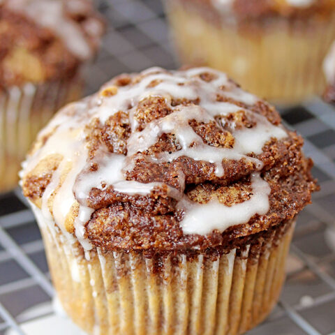 These Cinnamon Roll Muffins are soft, fluffy muffins loaded with cinnamon and brown sugar mixture, the topping and smooth sugar glaze. They will win you over with their taste and easy preparation.