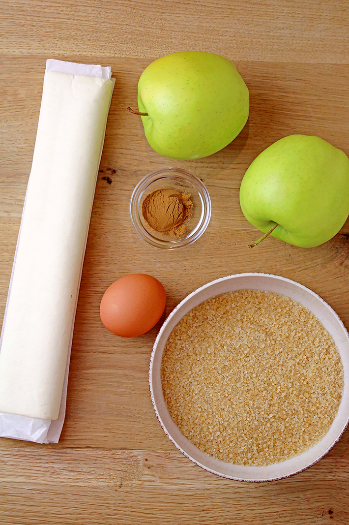 These Puff Pastry Apple Cinnamon Rings are a light treat made with only a few ingredients and it's perfect for the upcoming fall days. You will love juicy apples with cinnamon in a flaky puff pastry at first bite. They taste like apple pie and yet, they’re so different. These lovely rings are a must make fall treat. 