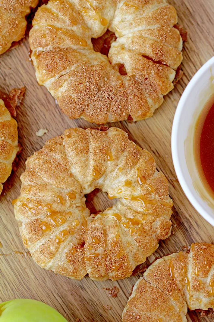 These Puff Pastry Apple Cinnamon Rings are a light treat made with only a few ingredients and it's perfect for the upcoming fall days. You will love juicy apples with cinnamon in a flaky puff pastry at first bite. They taste like apple pie and yet, they’re so different. These lovely rings are a must make fall treat.