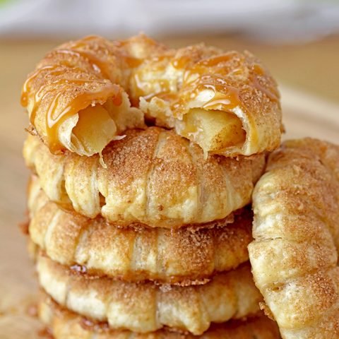 These Puff Pastry Apple Cinnamon Rings are a light treat made with only a few ingredients and it's perfect for the upcoming fall days. You will love juicy apples with cinnamon in a flaky puff pastry at first bite. They taste like apple pie and yet, they’re so different. These lovely rings are a must make fall treat. 