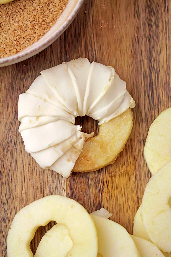 These Puff Pastry Apple Cinnamon Rings are a light treat made with only a few ingredients and it's perfect for the upcoming fall days. You will love juicy apples with cinnamon in a flaky puff pastry at first bite. They taste like apple pie and yet, they’re so different. These lovely rings are a must make fall treat. 