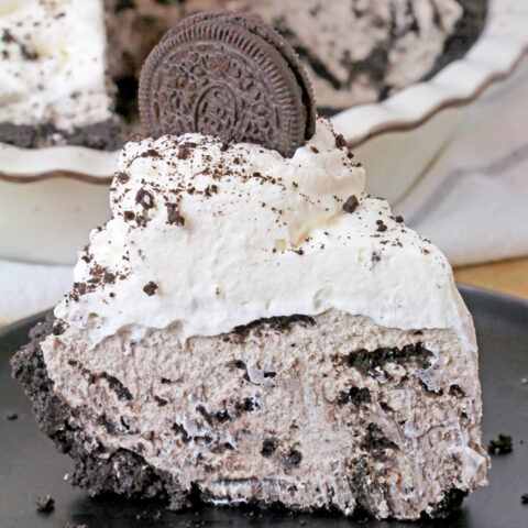 This Easy No Bake Oreo Cream Pie, made with only 7 ingredients in just 15 minutes, is perfect for the holidays and gatherings and will become your favorite dessert. It has a crunchy Oreo cookie crust, a creamy filling made with cream cheese and heavy whipping cream, filled with broken Oreos, and topped with homemade whipped topping.