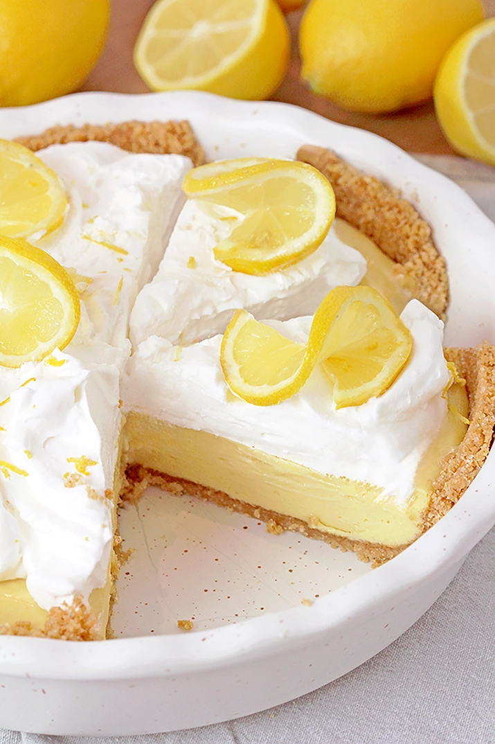 Easy Lemon Pie is a quick and simple recipe for a refreshing lemon pie with a crisp graham cracker crust, creamy filling made with sweetened condensed milk, and a light whipped topping – the perfect dessert for any season, especially spring and summer. I also love making this pie for Easter!