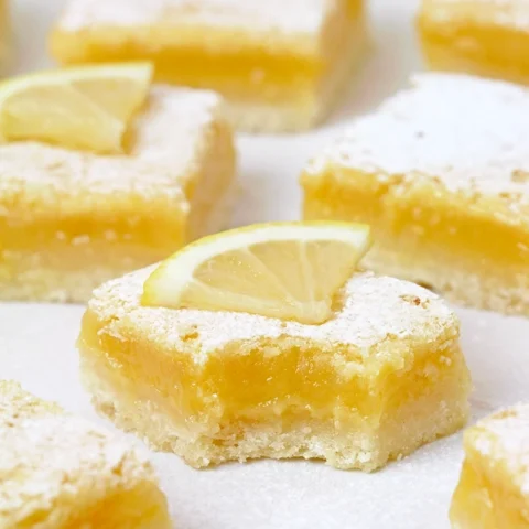 Looking for the perfect Easy lemon bars recipe? These homemade lemon bars with a buttery shortbread crust and tangy lemon filling are the ultimate lemon dessert.