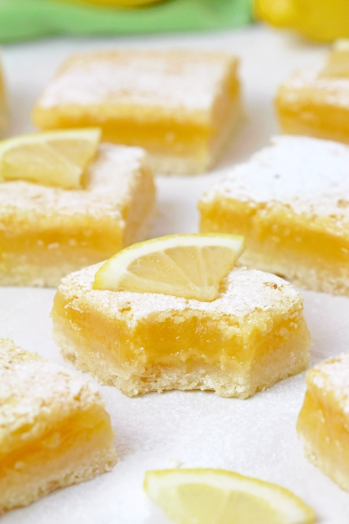 Looking for the perfect Easy lemon bars recipe? These homemade lemon bars with a buttery shortbread crust and tangy lemon filling are the ultimate lemon dessert.