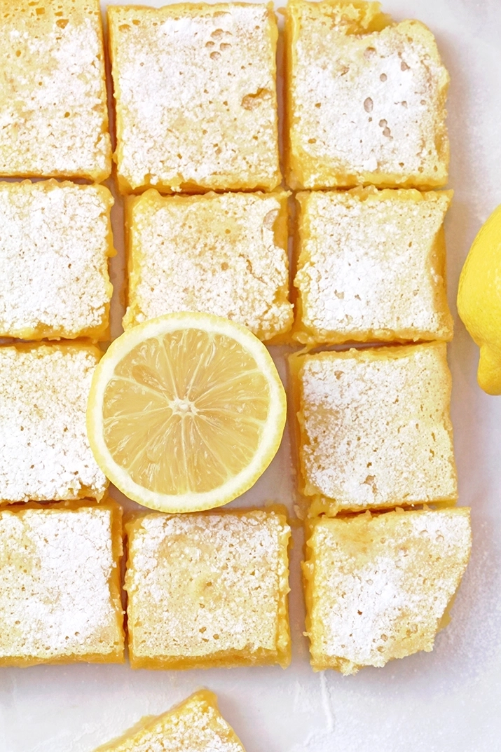 Looking for the perfect Easy lemon bars recipe? These homemade lemon bars with a buttery shortbread crust and tangy lemon filling are the ultimate lemon dessert.