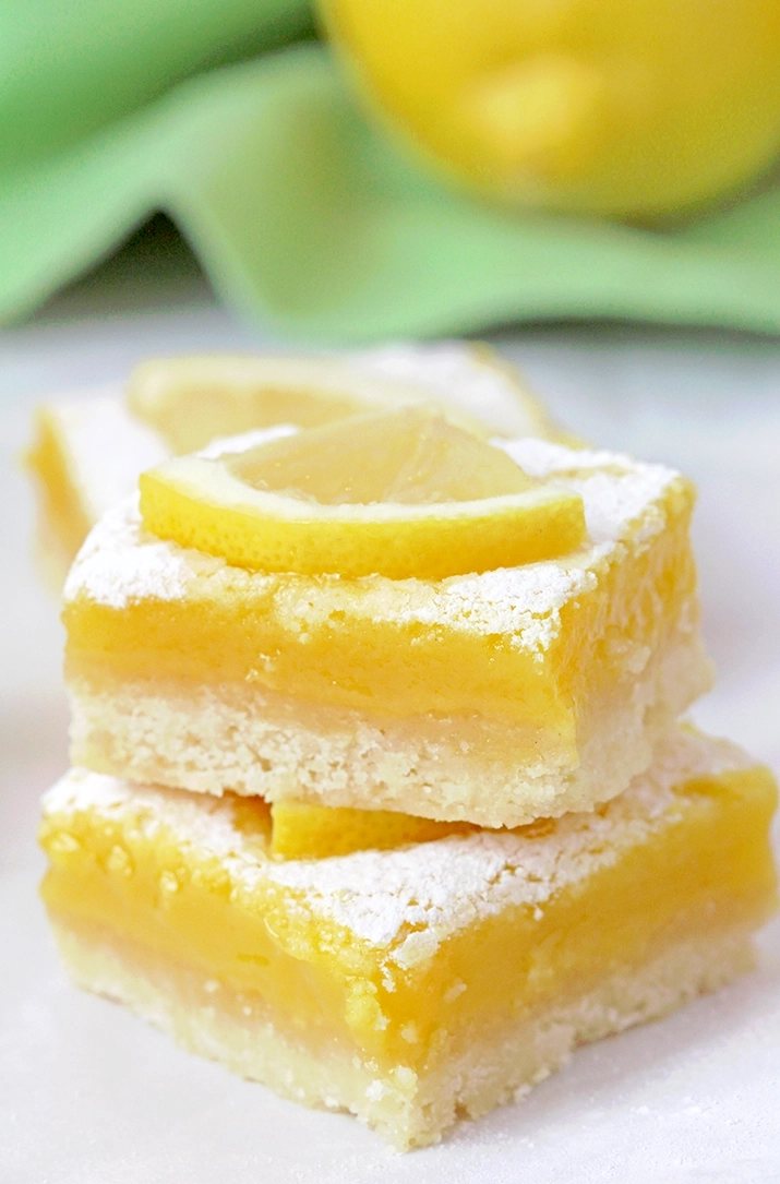 Looking for the Easiest lemon bars recipe? These homemade lemon bars with a buttery shortbread crust and tangy lemon filling are the ultimate lemon dessert.